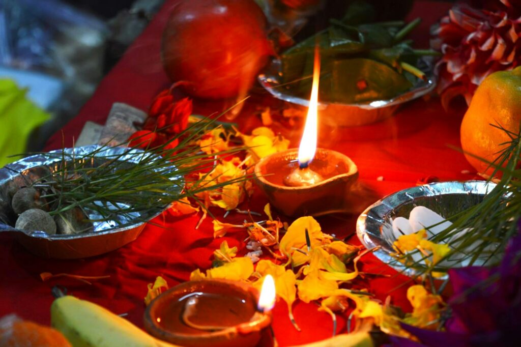 a candle in a bowl of food
